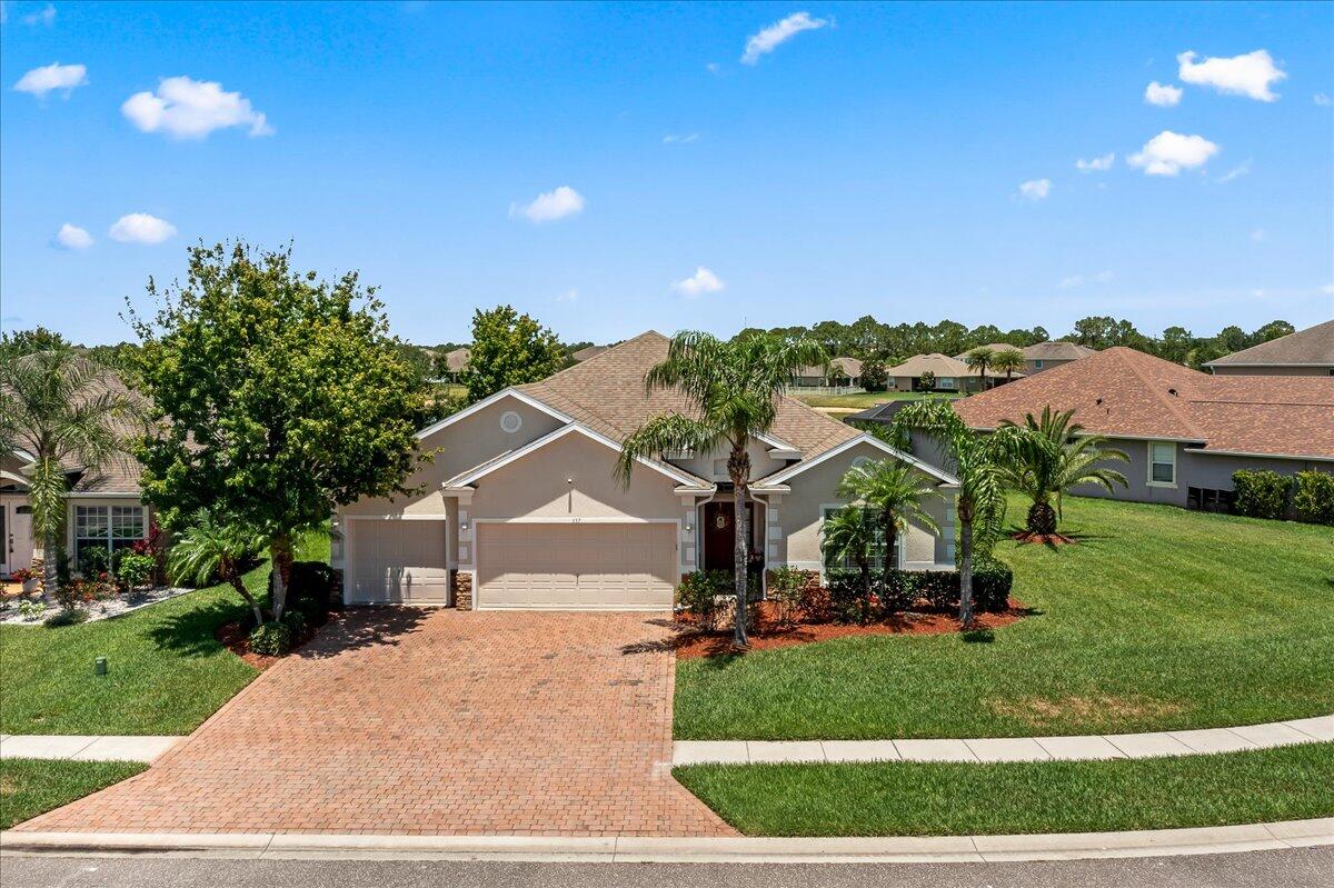 337 Abernathy Circle Palm Bay, FL 32909 - Photo 3 of 51 front view of house with a yard