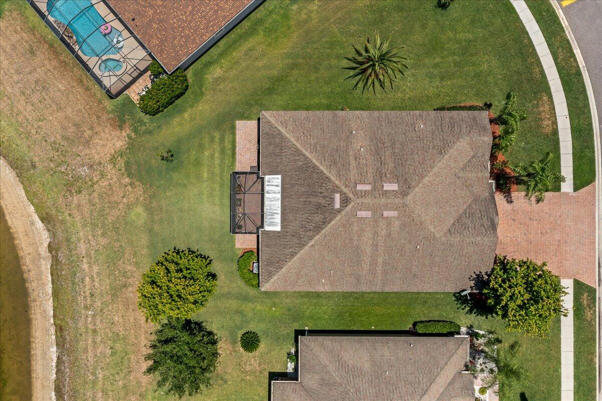 337 Abernathy Circle Palm Bay, FL 32909 - Photo 41 of 51 an aerial view of a house with a yard