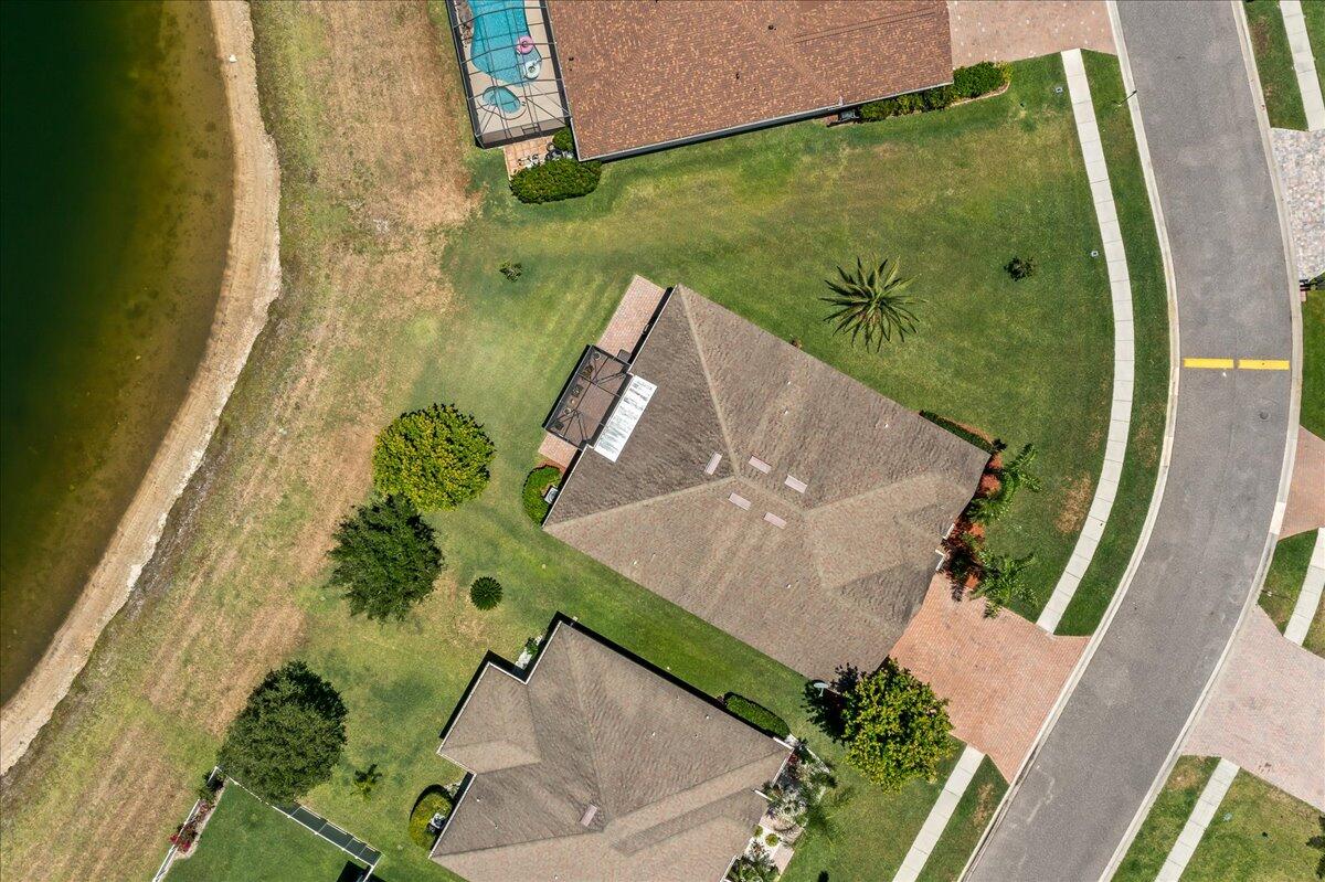 337 Abernathy Circle Palm Bay, FL 32909 - Photo 42 of 51 an aerial view of a house with a yard