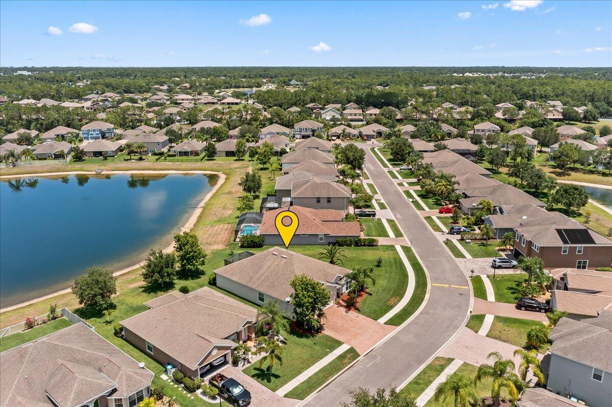 337 Abernathy Circle Palm Bay, FL 32909 - Photo 45 of 51 an aerial view of residential houses with outdoor space