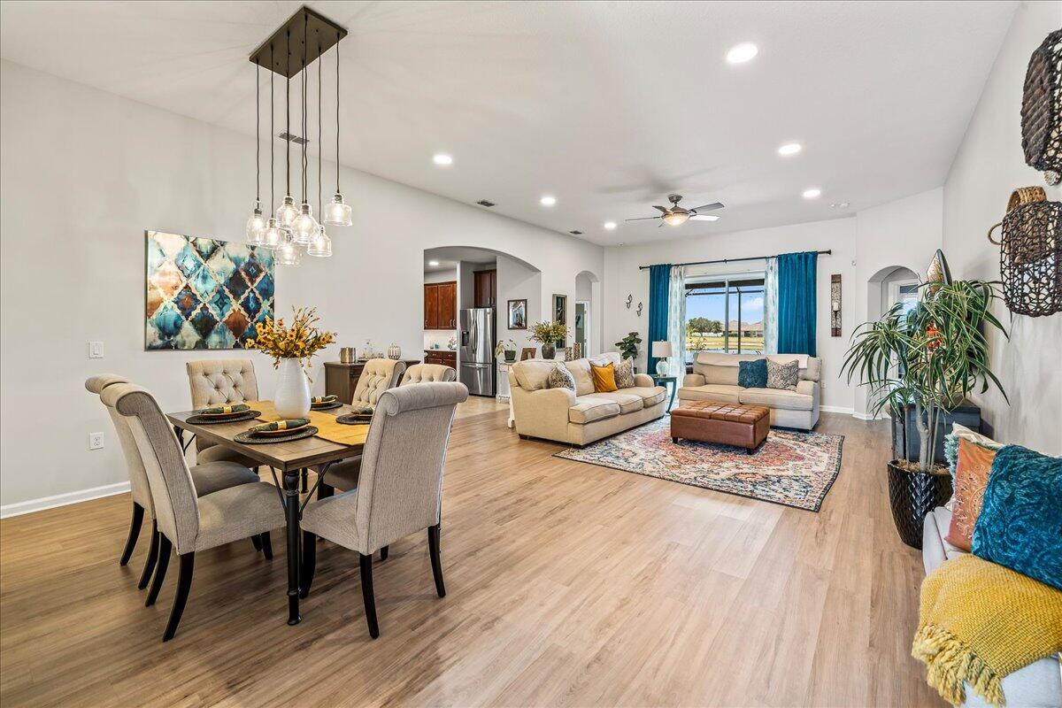 337 Abernathy Circle Palm Bay, FL 32909 - Photo 6 of 51 a living room with furniture and a chandelier