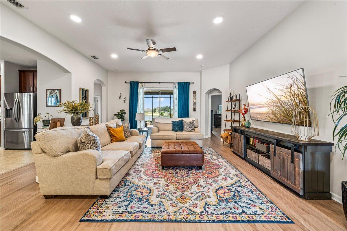 337 Abernathy Circle Palm Bay, FL 32909 - Photo 8 of 51 a living room with furniture and wooden floor