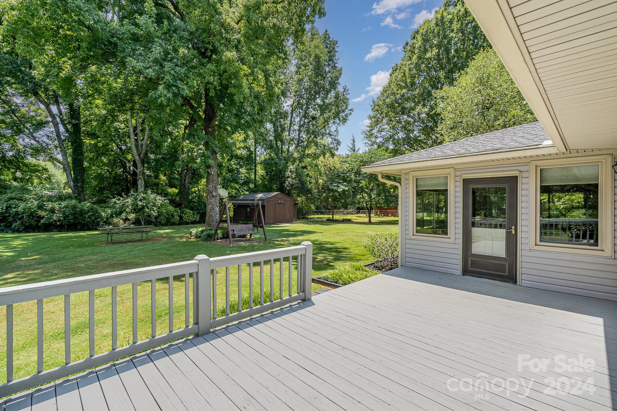 5124 Margaret Wallace Road Matthews, NC 28105 - Photo 22 of 26 a view of a house with a yard