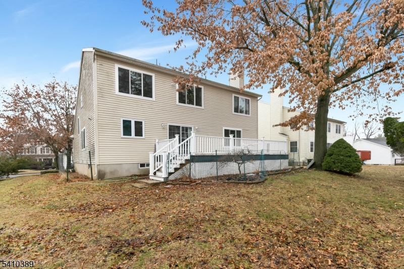 450 Vanderveer Road Bridgewater, NJ 08807 - Photo 42 of 44 a view of a house with a yard and a tree