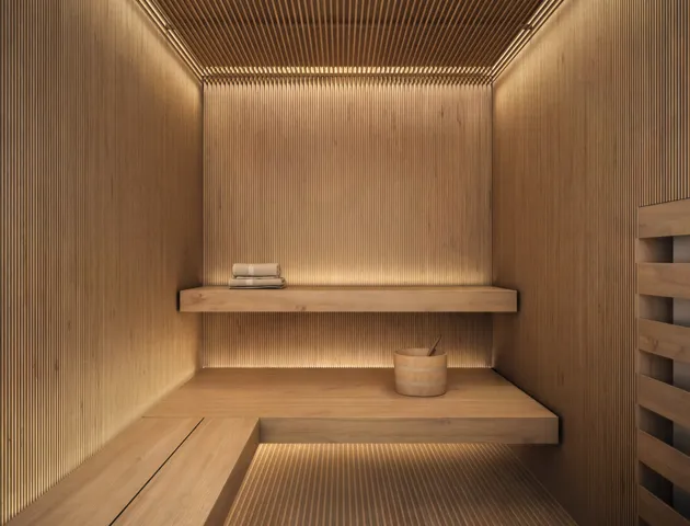 a room with gym equipment and a mirror