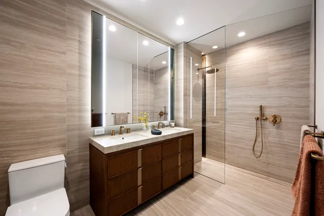 a kitchen with a table chairs sink and cabinets