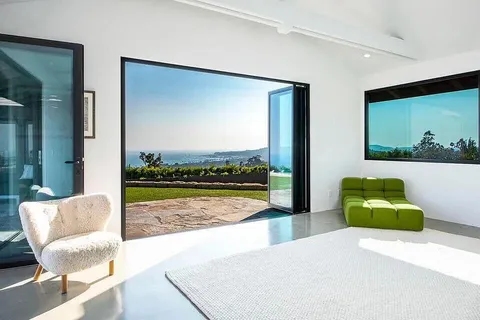 a view of a living room and a porch