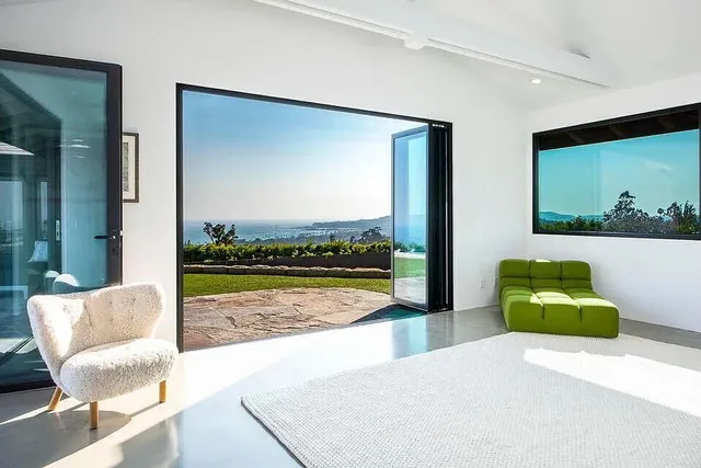 a view of a living room and a porch