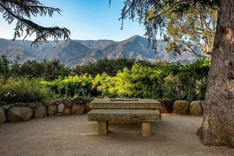 a garden view with a seating space