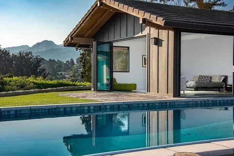 a view of a house with a swimming pool