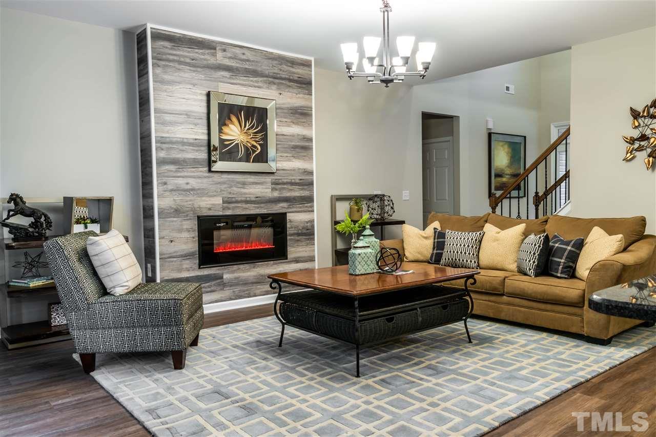 5317 B Fayetteville Road Durham, NC 27713 - Photo 2 of 30 Living room with fireplace
