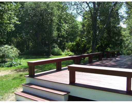 322 Lincoln Street Lexington, MA 02421 - Photo 3 of 9 a view of a bench in the garden