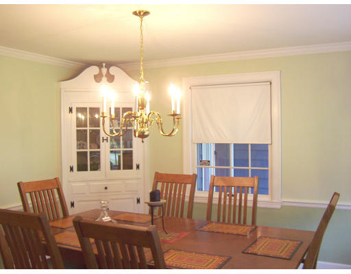 322 Lincoln Street Lexington, MA 02421 - Photo 7 of 9 a view of a dining room with furniture