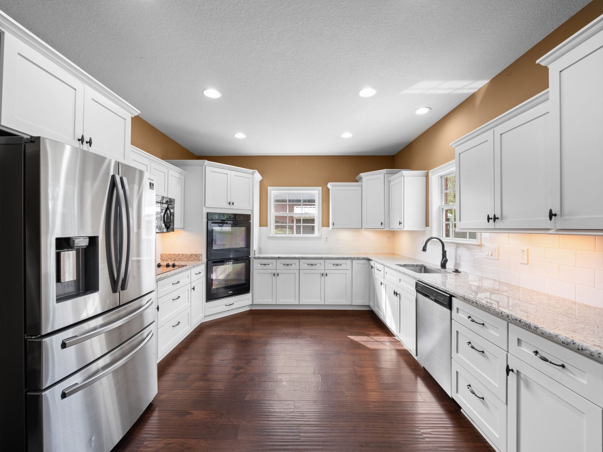 650 Dixie Bee Road Clarksville, TN 37043 - Photo 11 of 42 a large kitchen with stainless steel appliances sink a microwave and cabinets