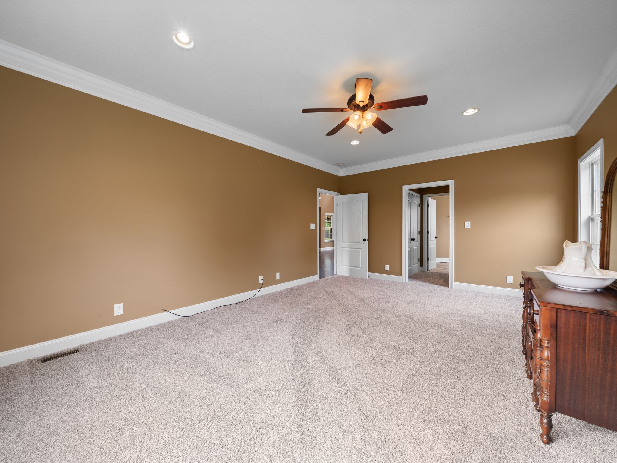 650 Dixie Bee Road Clarksville, TN 37043 - Photo 20 of 42 a view of a livingroom with a chandelier fan and wooden floor