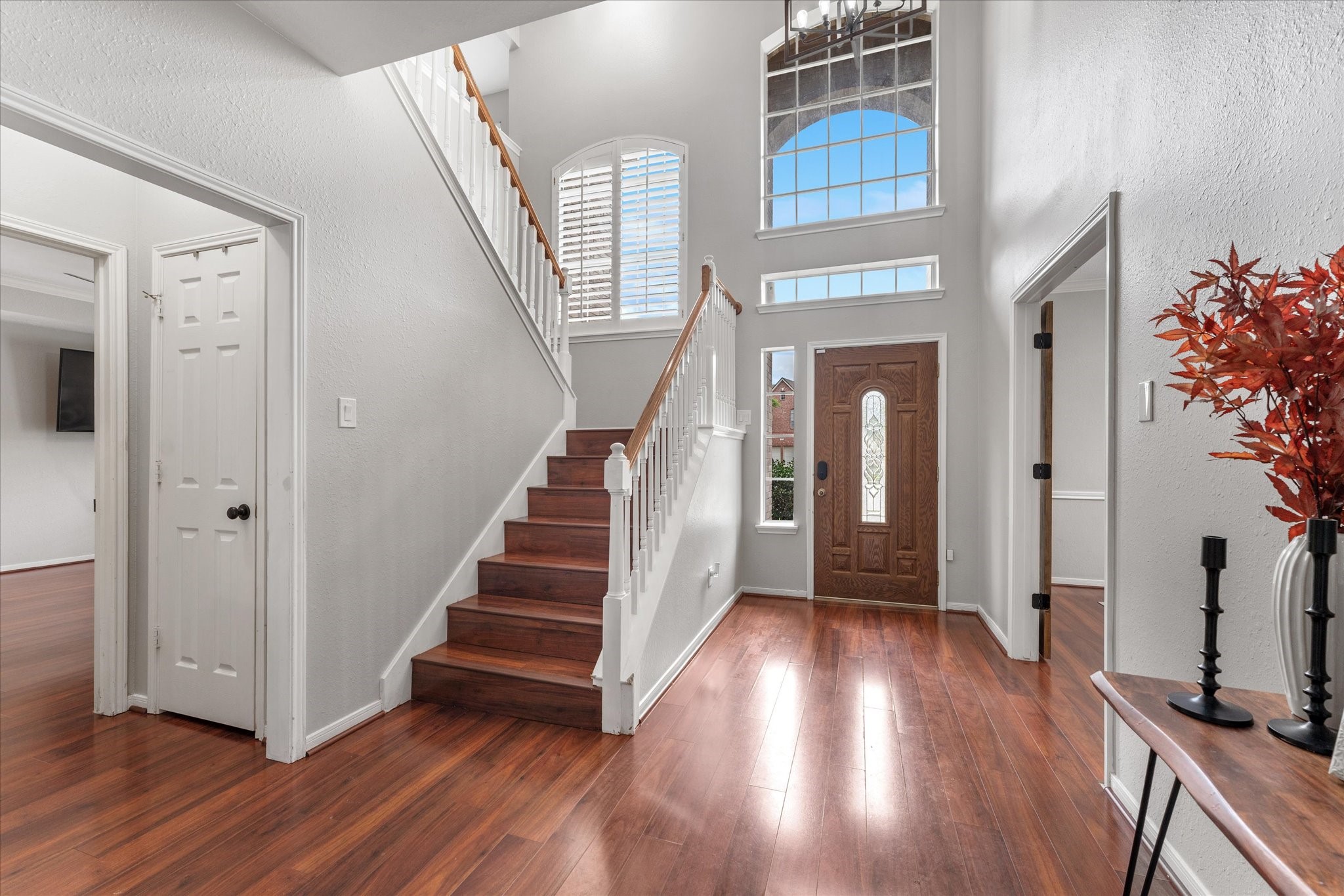 4318 Raintree Court Pasadena, TX 77505 - Photo 11 of 36 a view of entryway with wooden floor and stairs