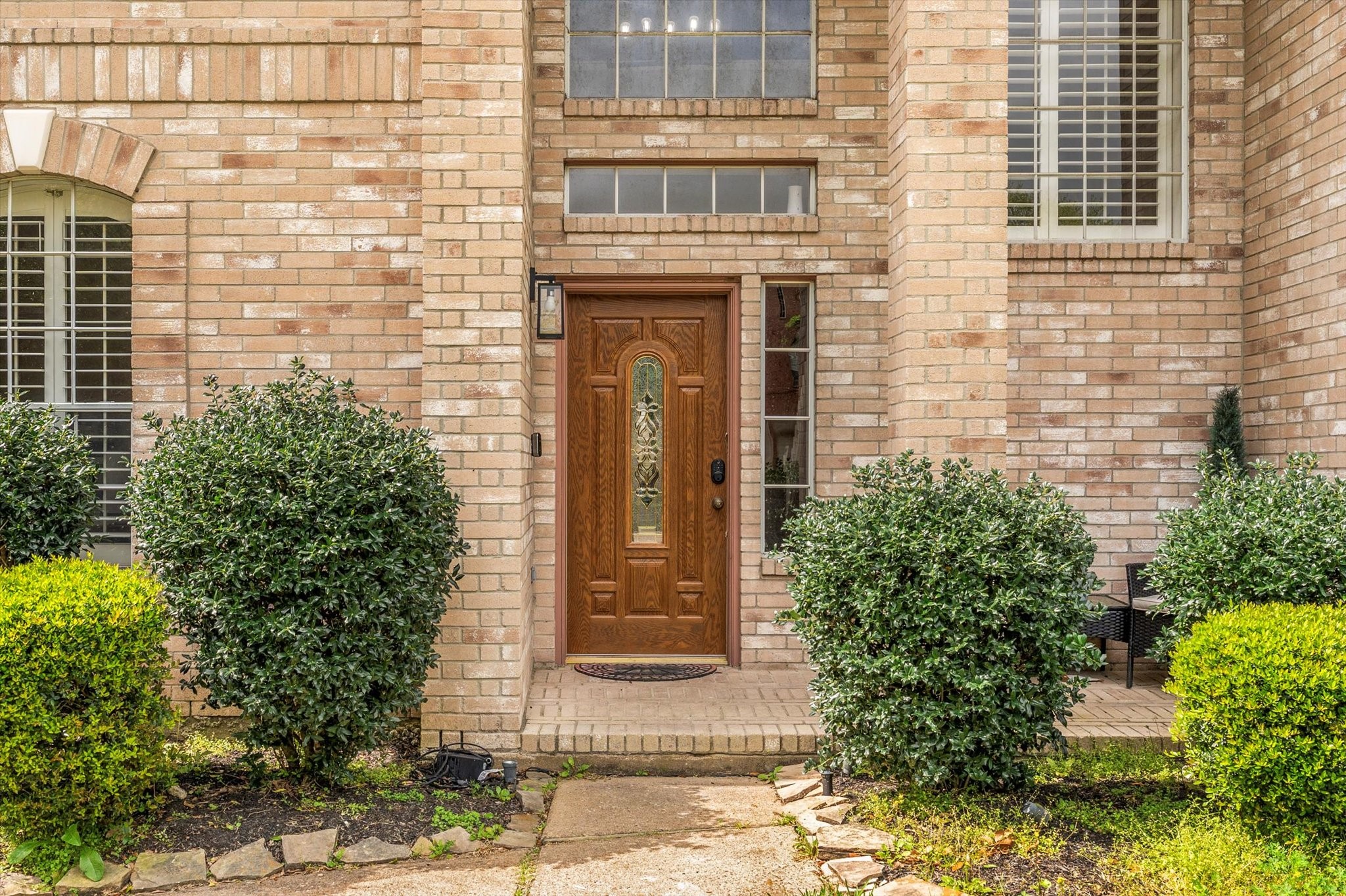 4318 Raintree Court Pasadena, TX 77505 - Photo 2 of 36 a front view of a house with a yard