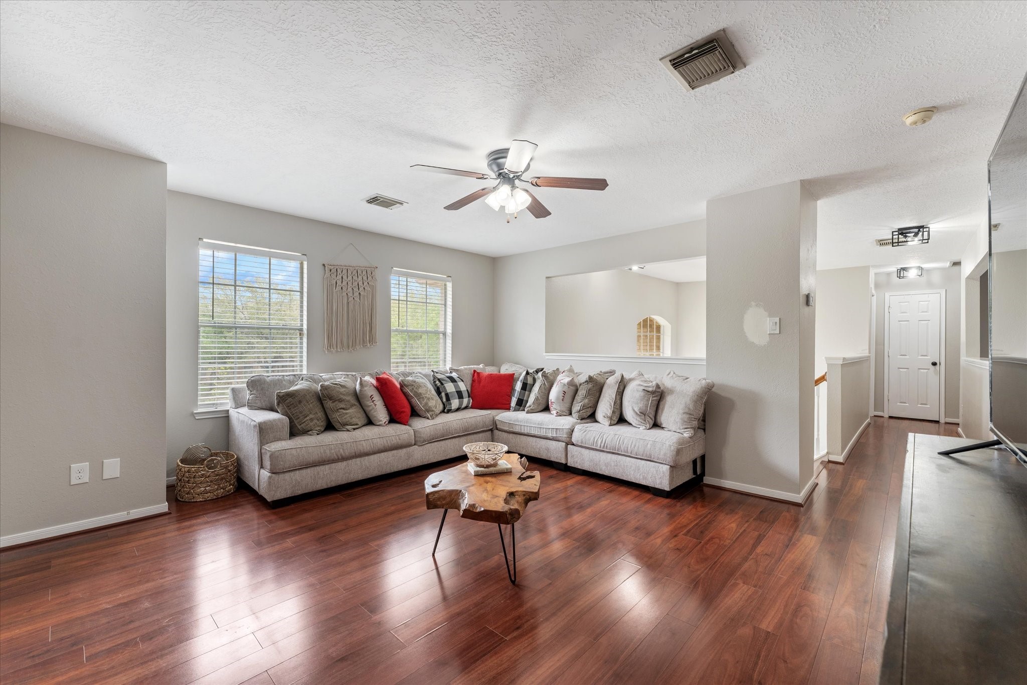 4318 Raintree Court Pasadena, TX 77505 - Photo 24 of 36 a living room with furniture and a wooden floor