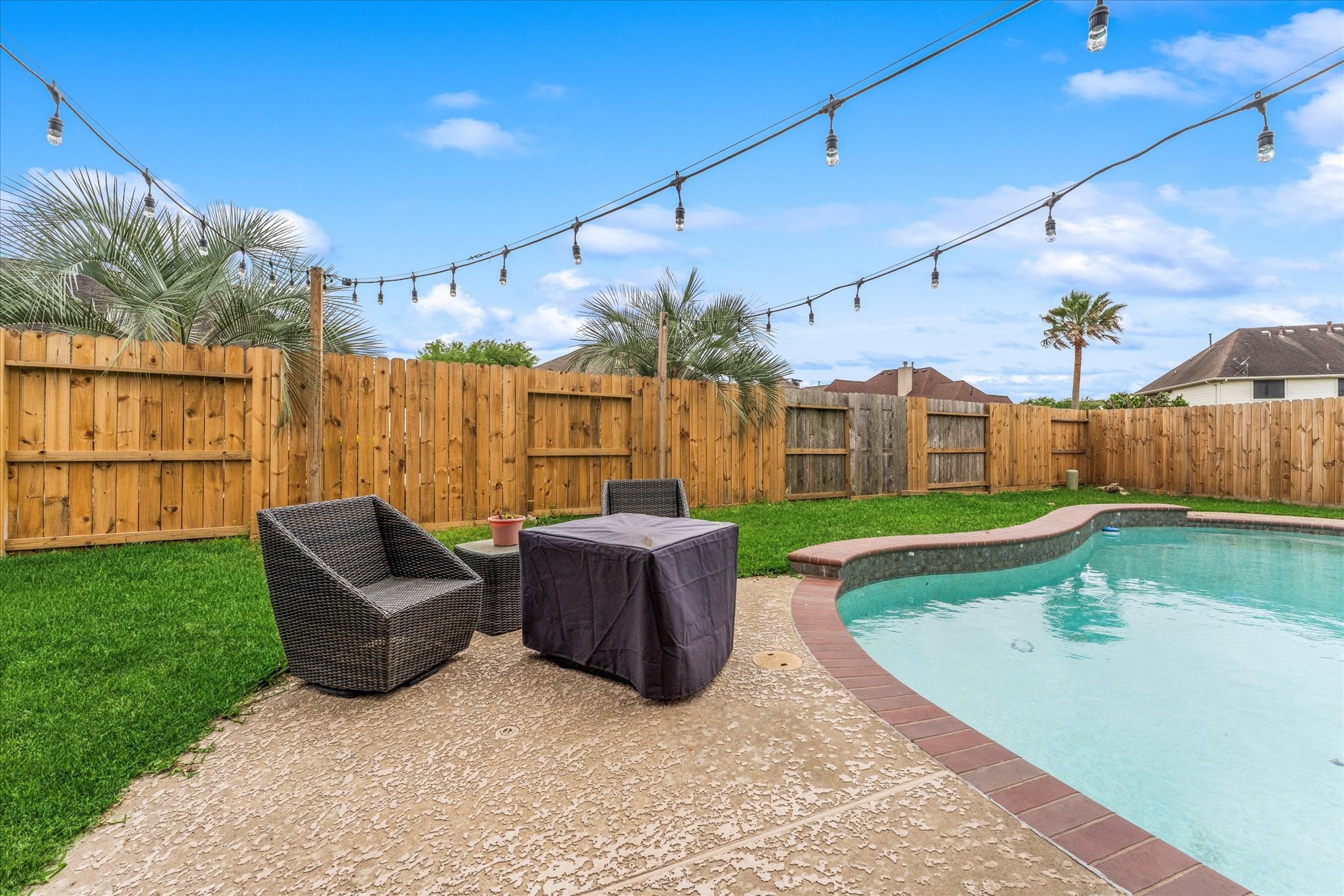 4318 Raintree Court Pasadena, TX 77505 - Photo 34 of 36 a view of a house with backyard and a tub