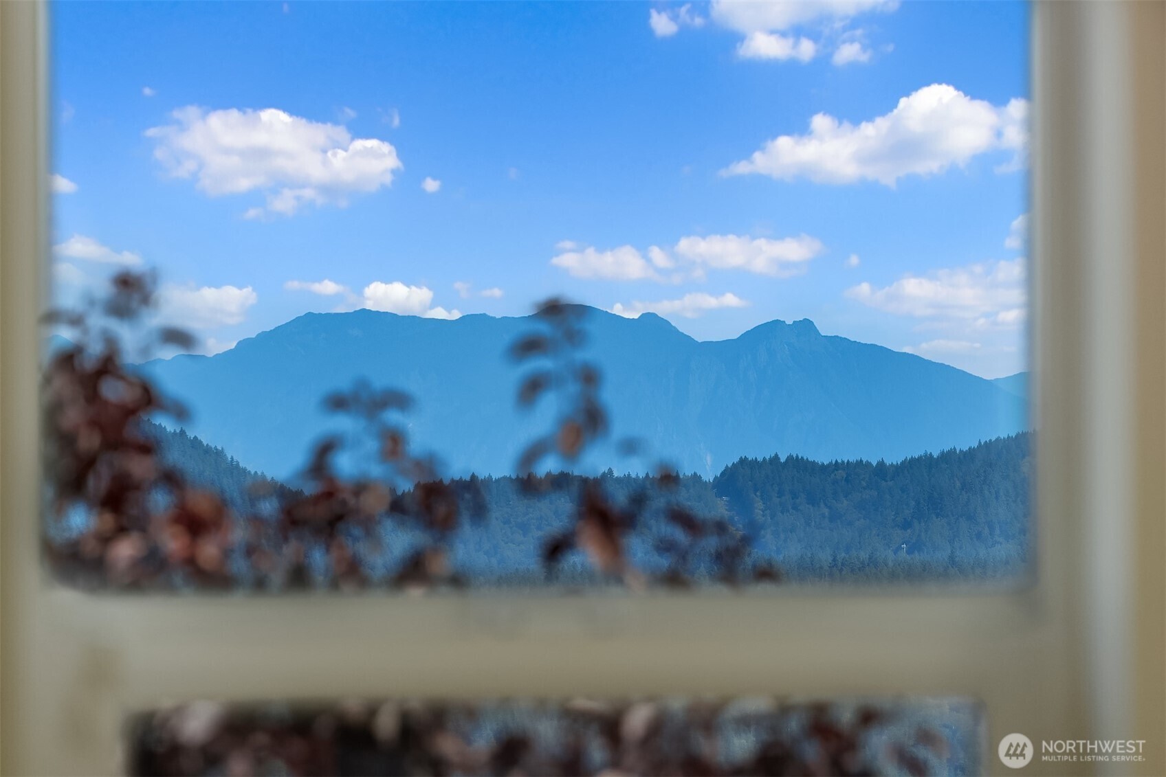 597 Alpine Ridge Place Northwest Issaquah, WA 98027 - Photo 29 of 32 a view of a lake
