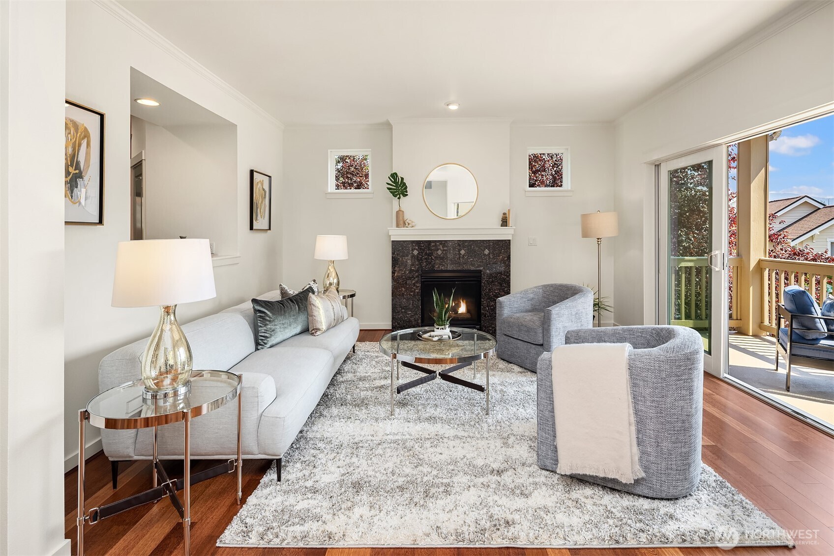 597 Alpine Ridge Place Northwest Issaquah, WA 98027 - Photo 5 of 32 a living room with furniture and a fireplace