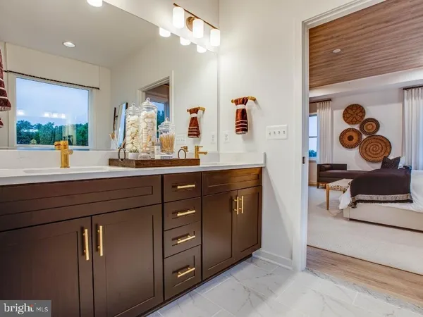 a kitchen with a sink and a stove