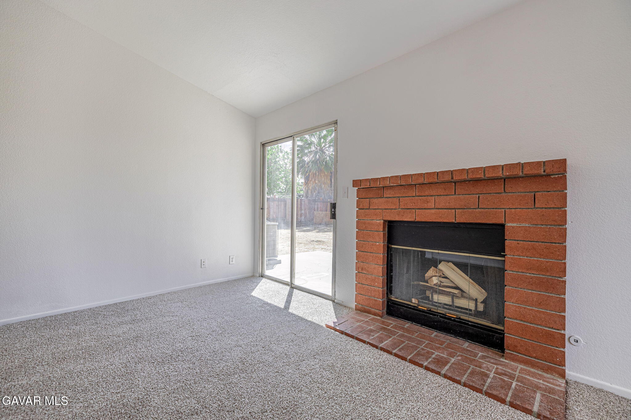 2340 Lightcap Street Lancaster, CA 93535 - Photo 18 of 40 a living room with a fireplace