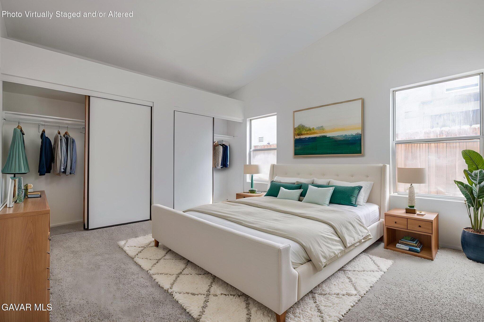 2340 Lightcap Street Lancaster, CA 93535 - Photo 20 of 40 a bedroom with a bed and a couch