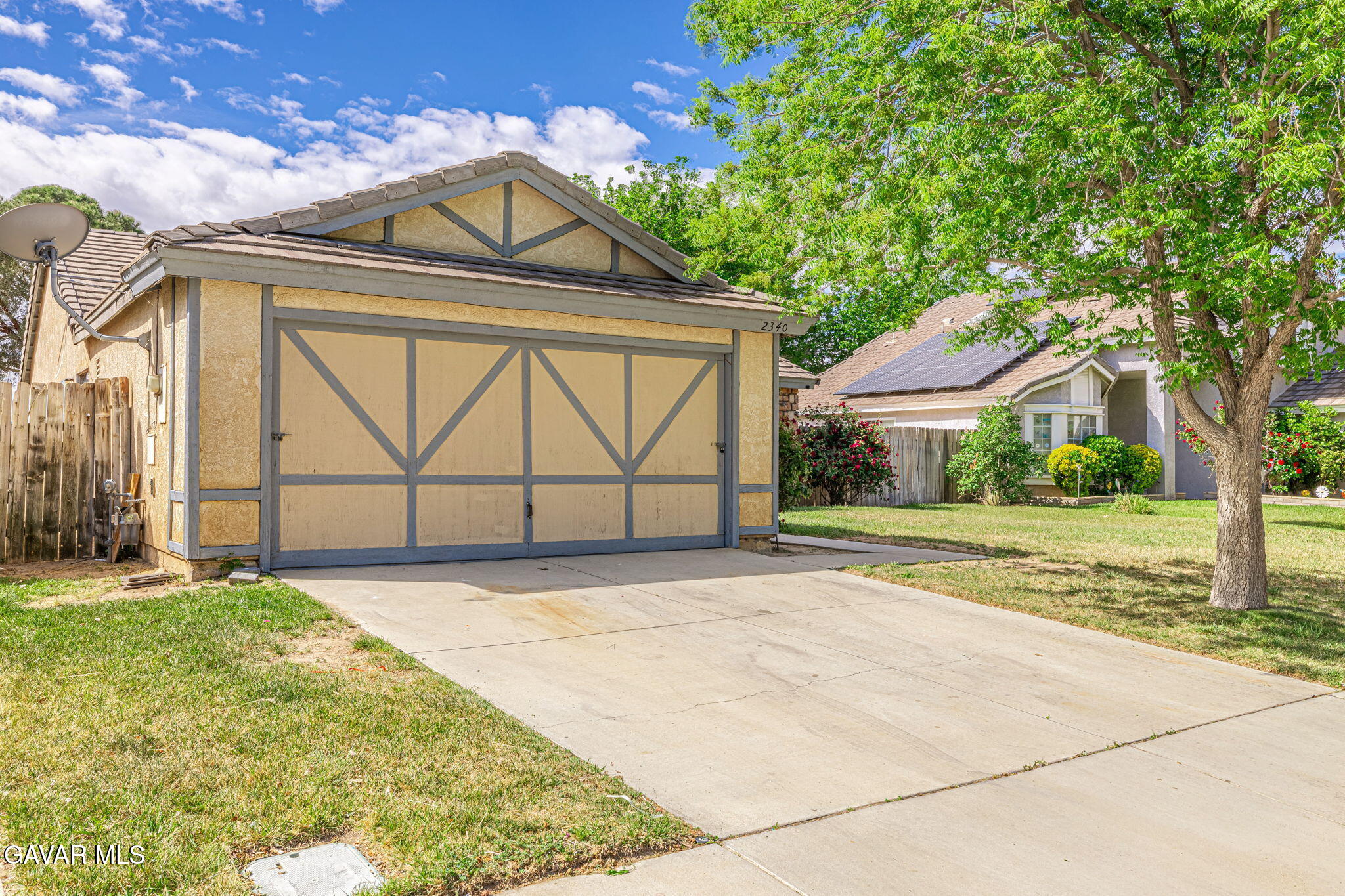 2340 Lightcap Street Lancaster, CA 93535 - Photo 2 of 40 a front view of a house with garden