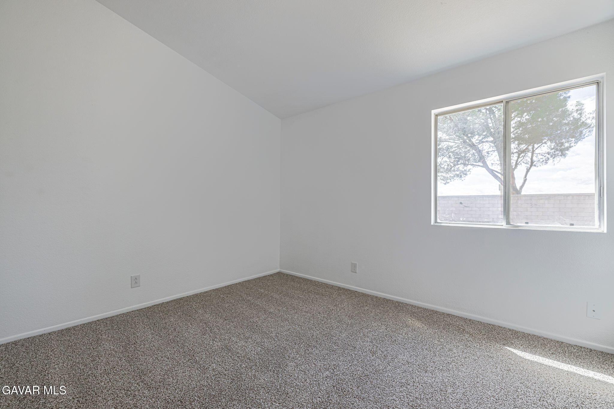 2340 Lightcap Street Lancaster, CA 93535 - Photo 26 of 40 an empty room with a window
