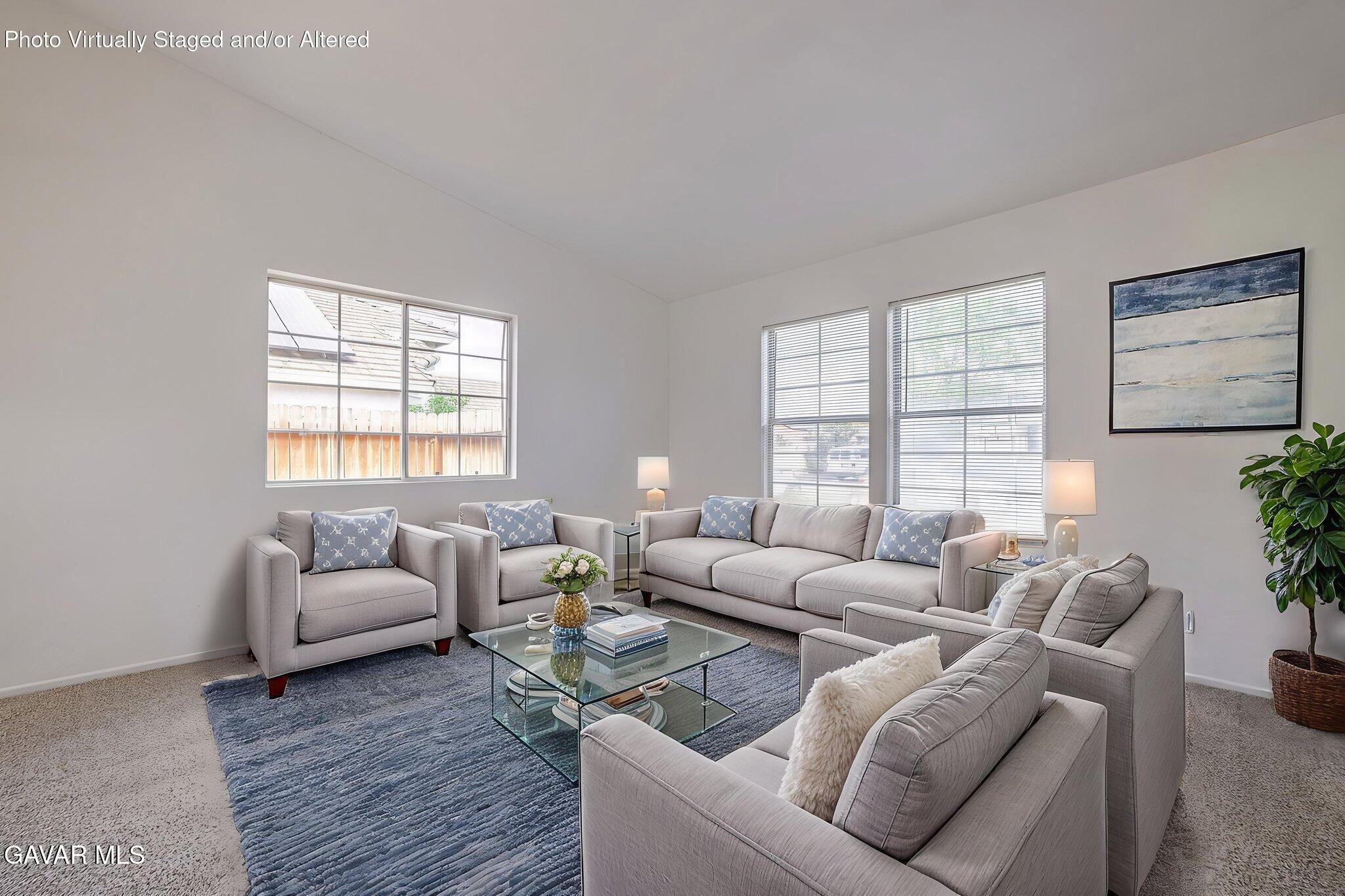 2340 Lightcap Street Lancaster, CA 93535 - Photo 5 of 40 a living room with furniture and a large window