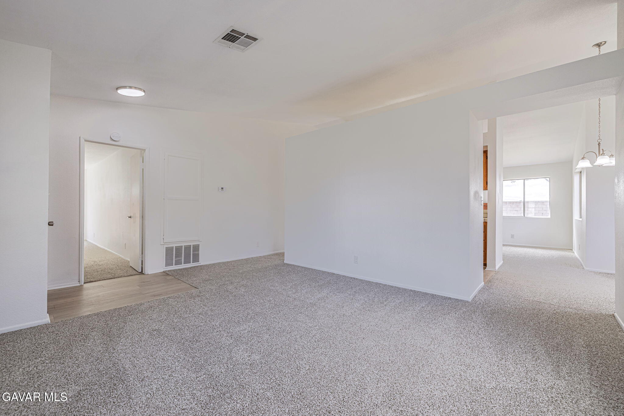 2340 Lightcap Street Lancaster, CA 93535 - Photo 8 of 40 a view of an empty room and glass door
