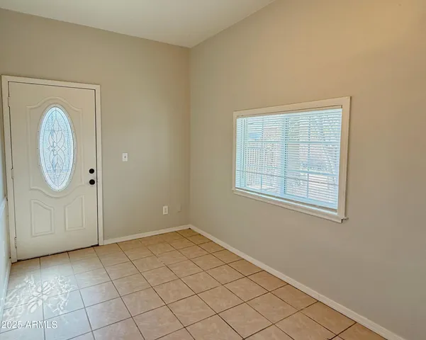 an empty room with window