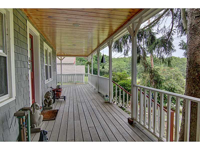 43 Serpentine Road Warren, RI 02885 - Photo 14 of 23 Porch. Farmers porch on front of house.