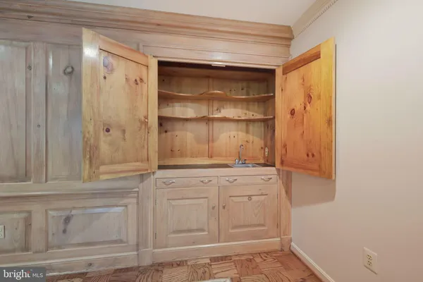 a view of cabinets and window