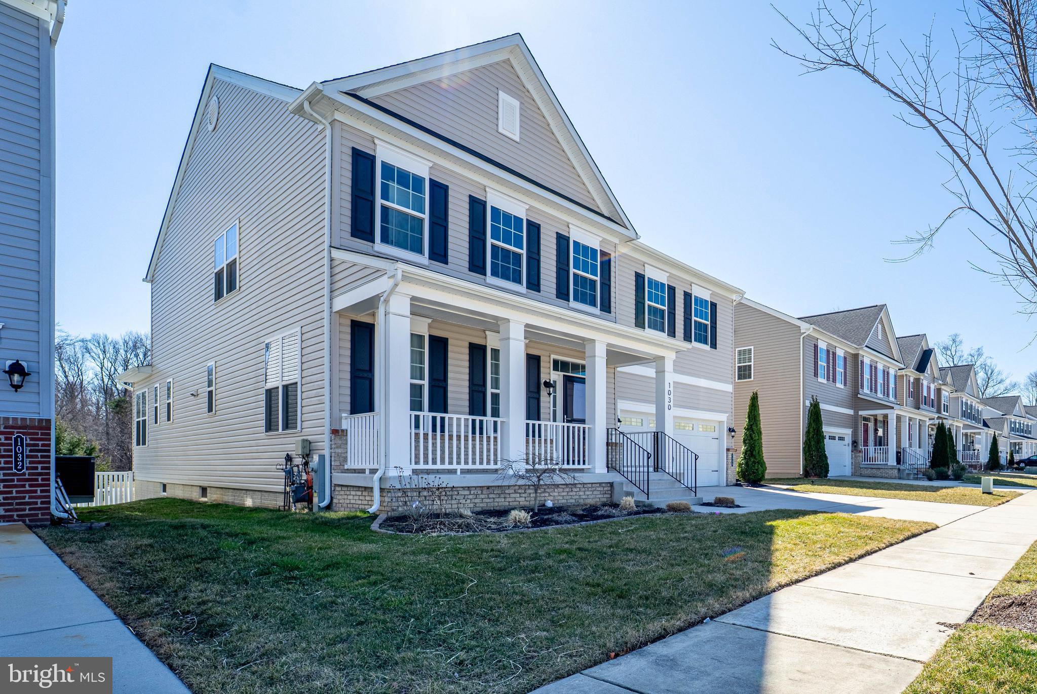 1030 Collier Run Road Baltimore, MD 21220 - Photo 2 of 48 a front view of a house with a yard