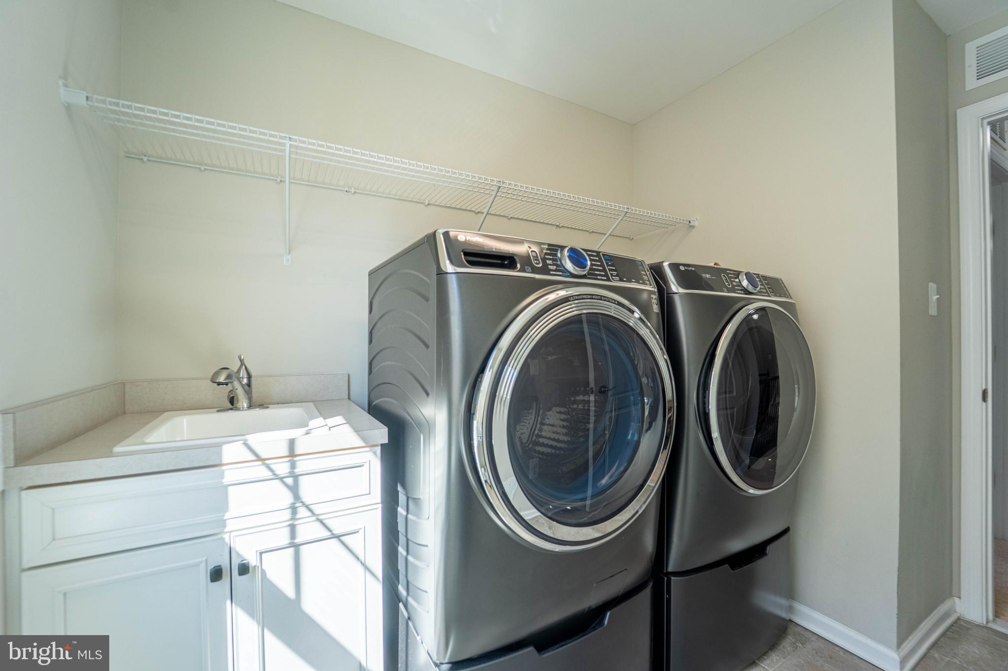 1030 Collier Run Road Baltimore, MD 21220 - Photo 27 of 48 a utility room with dryer and washer