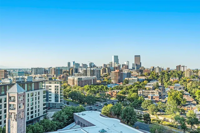 a view of a city with tall buildings