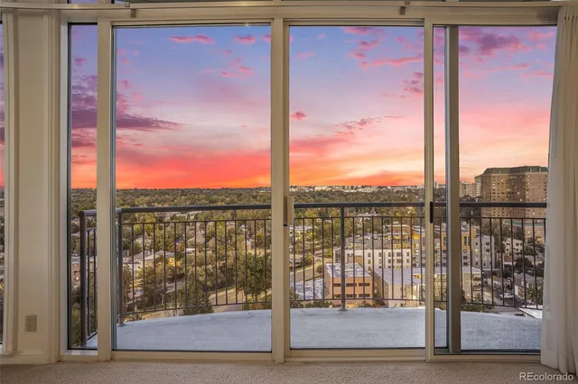 a view of a city from a living room
