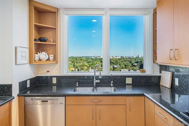 a kitchen with a sink and a window