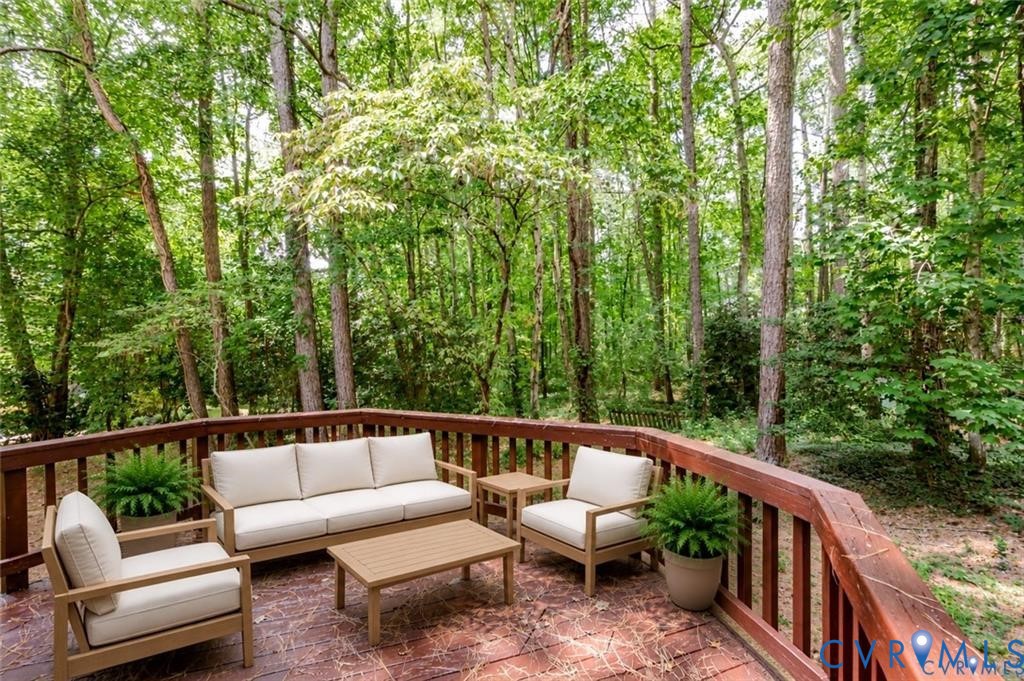 2806 Cove Ridge Road Midlothian, VA 23112 - Photo 8 of 42 Expansive wooden deck with a durable railing syste