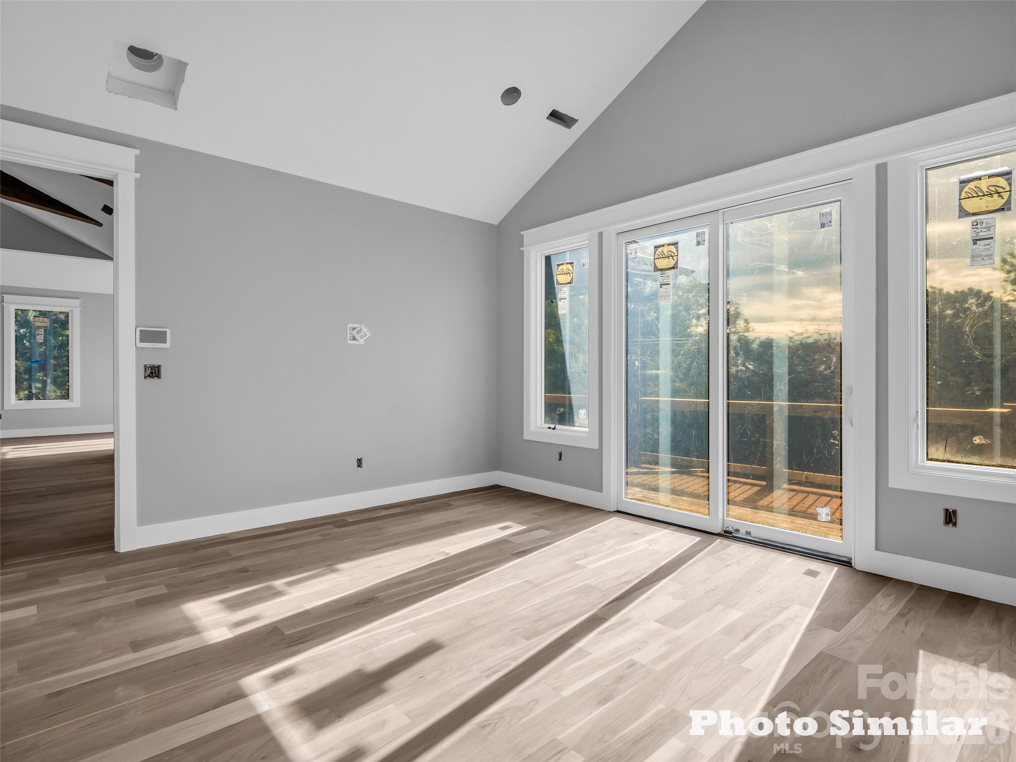 2 Jackson Ridge Ln Mill Spring Mill Spring, NC 28756 - Photo 20 of 37 a view of an empty room with a window