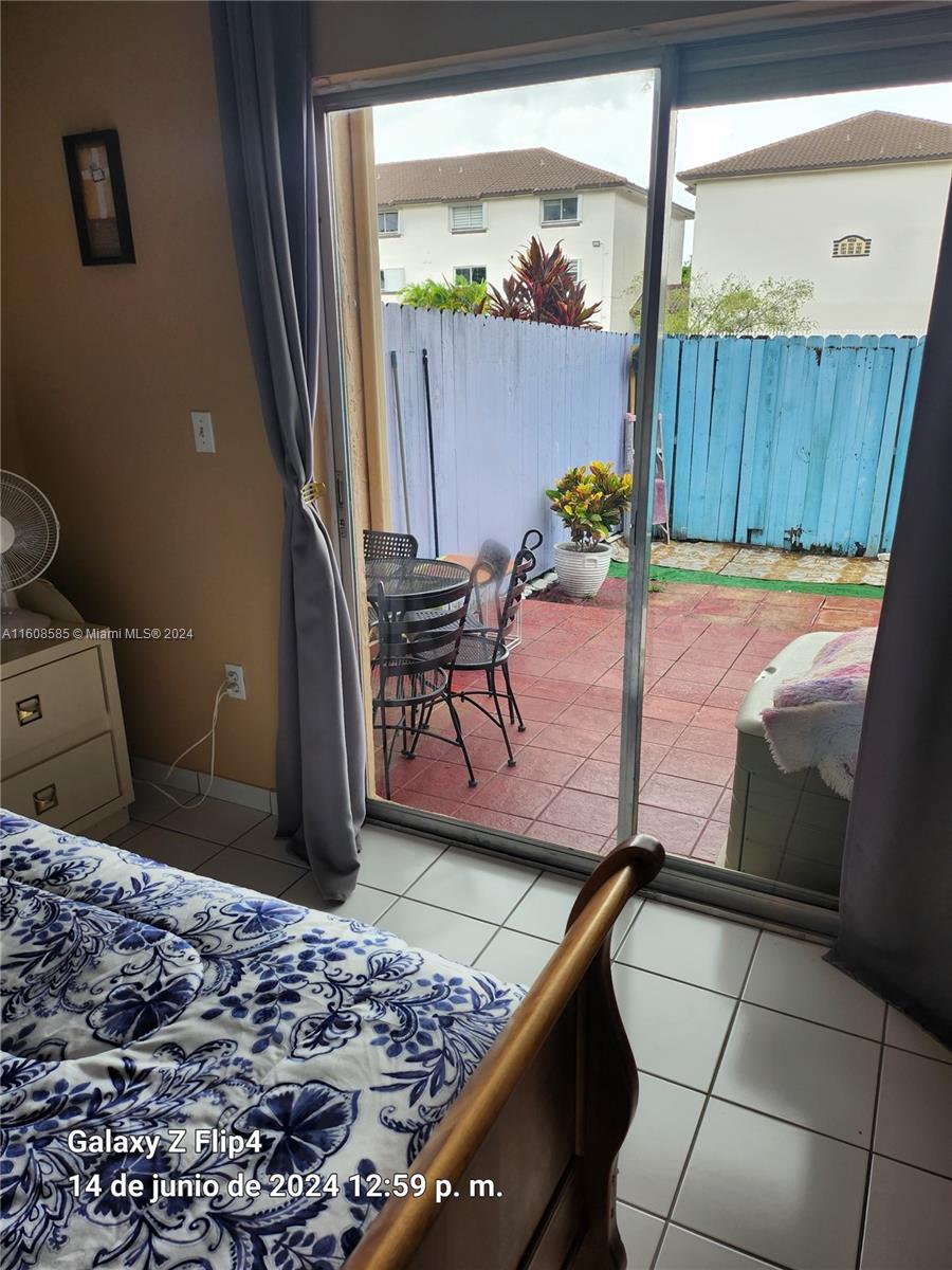 820 Southwest 105th Avenue, Unit 607 Miami, FL 33174 - Photo 11 of 22 a view of a living room and a rug
