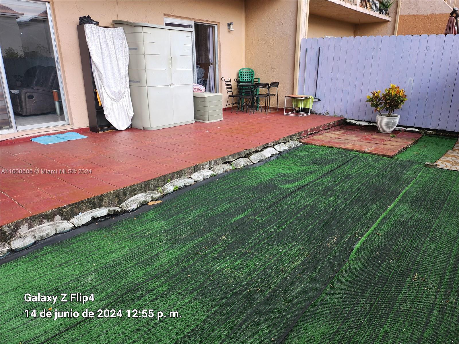 820 Southwest 105th Avenue, Unit 607 Miami, FL 33174 - Photo 20 of 22 a view of a backyard