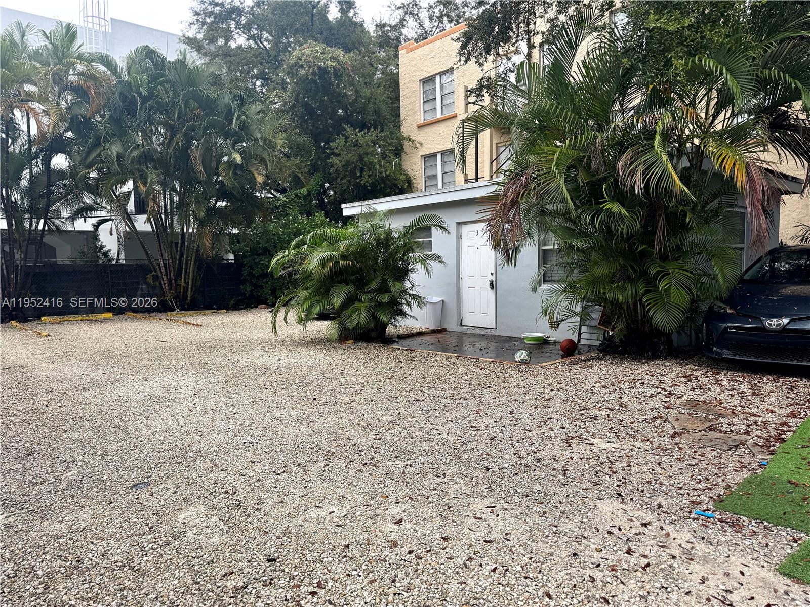 529 Southwest 3rd Street Miami, FL 33130 - Photo 4 of 12 a front view of a house with a yard