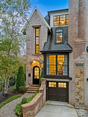 a front view of a house with glass windows
