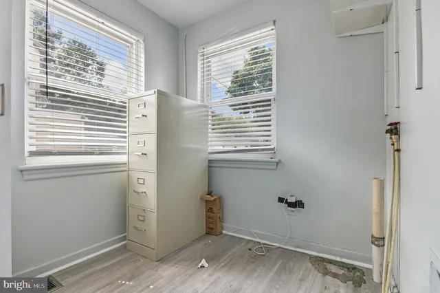 a view of a room that has a window in it