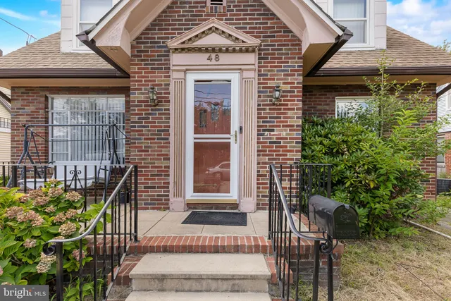 a front view of a house with entryway