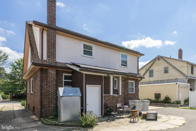 a front view of a house with yard