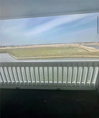 a view of balcony with ocean view